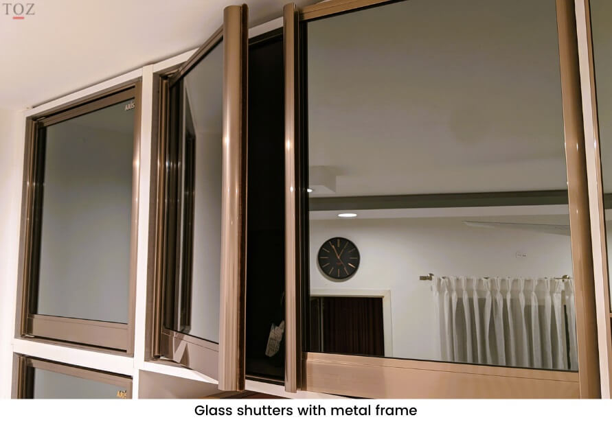 Glass shutter with metal frame